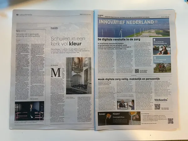 Krantenartikel in De Trouw waarin Iebele Otten van WeSeeDo vertelt over de inzet van beeldbellen in de zorg.
